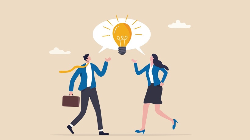 Two people with an idea light bulb