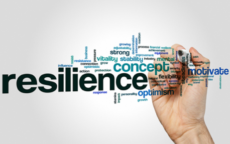 Hand drawing on transparent board with Resilience written.